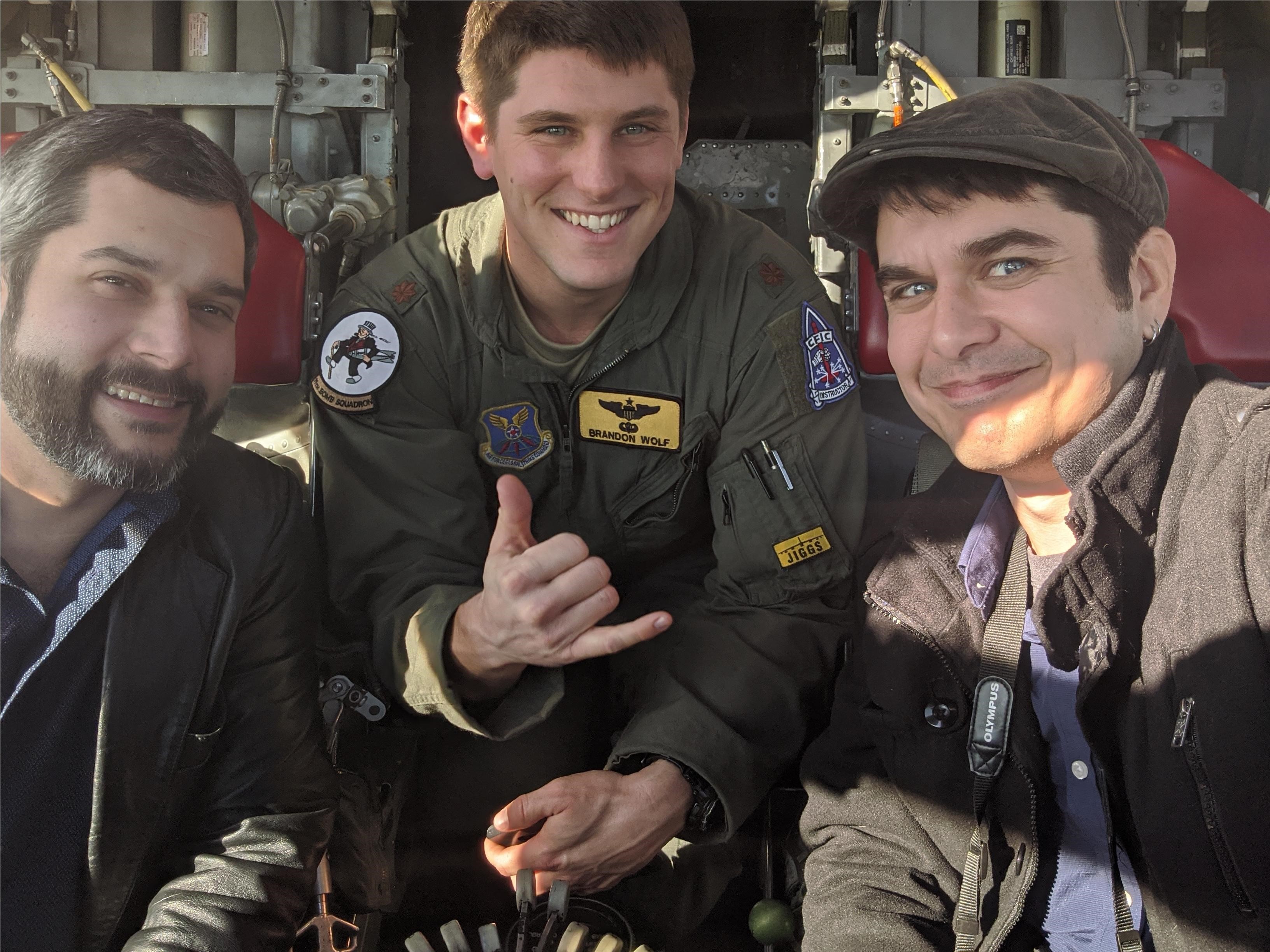 King Crow Studios founder Cody Louviere, Maj. Brandon Wolf and LSU alumni Daniel Norman on a B-52 bomber.