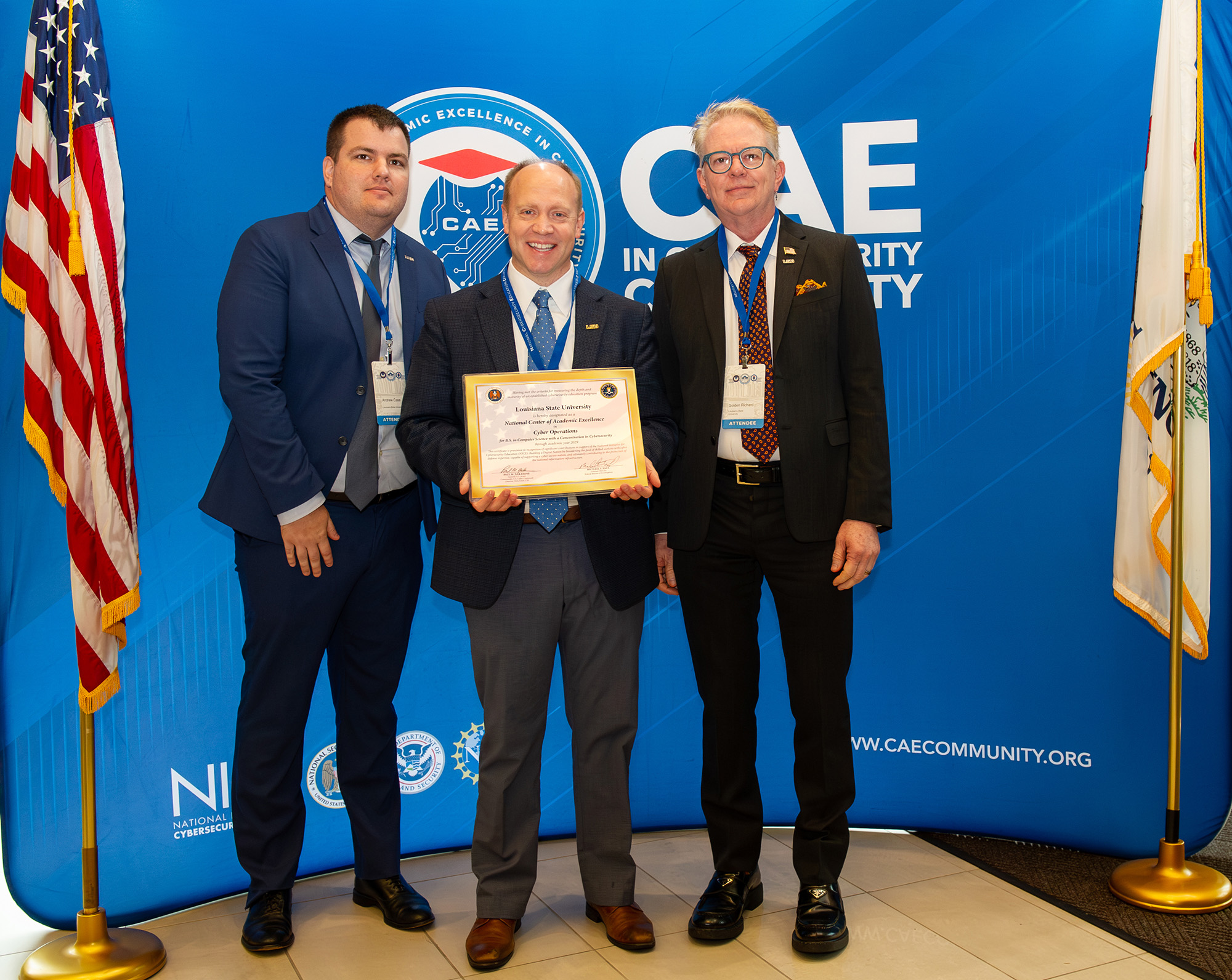 Andrew Case, Greg Trahan, and Golden Richard with certificate designating LSU as a Center of Academic Excellence in Cyber Operations