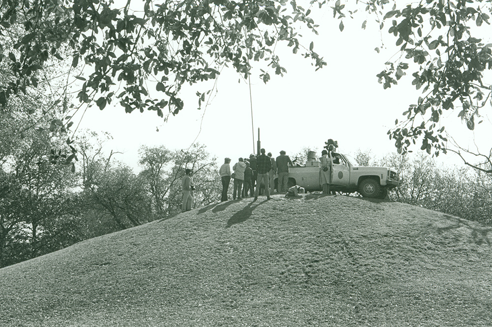 A team conducts core sampling on one of the mounds in 1985. 
