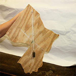 photo: Determine center of gravity with plumb line on an irregular shape or Map of Louisiana