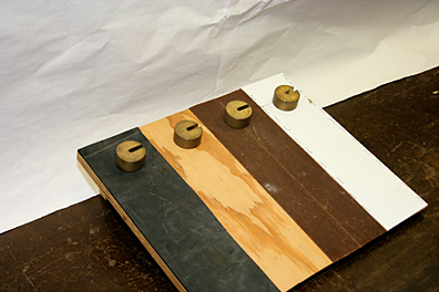 Friction - Board with several surfaces and sliding weights