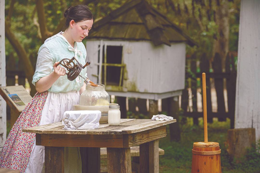 Woman churning butter