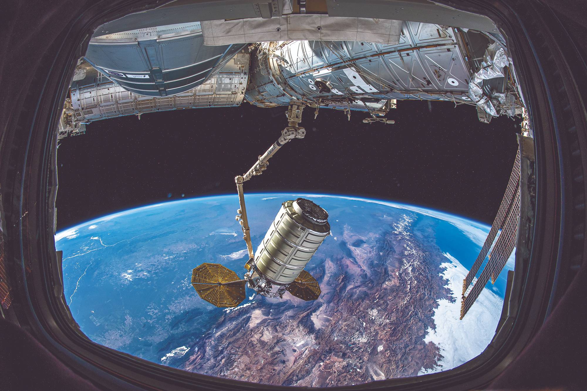 Northrop Grumman Cygnus cargo craft is brought aboard the space station
