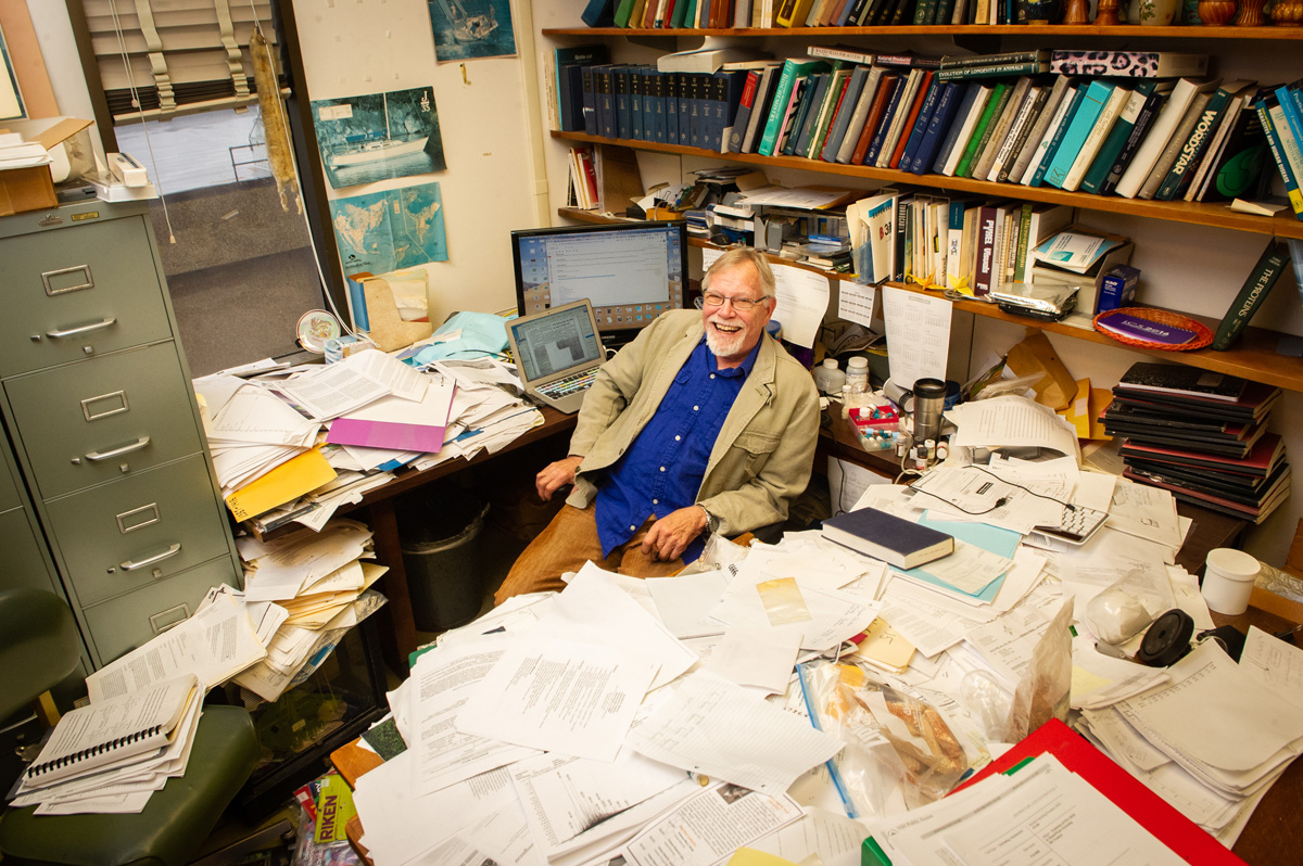 Biochemistry professor Roger Laine in his messy office