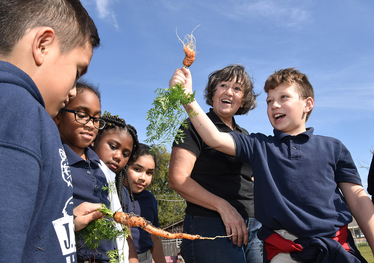 Denise Mayon and children at the J.S. Aucoin Elementary School in Amelia, Louisiana