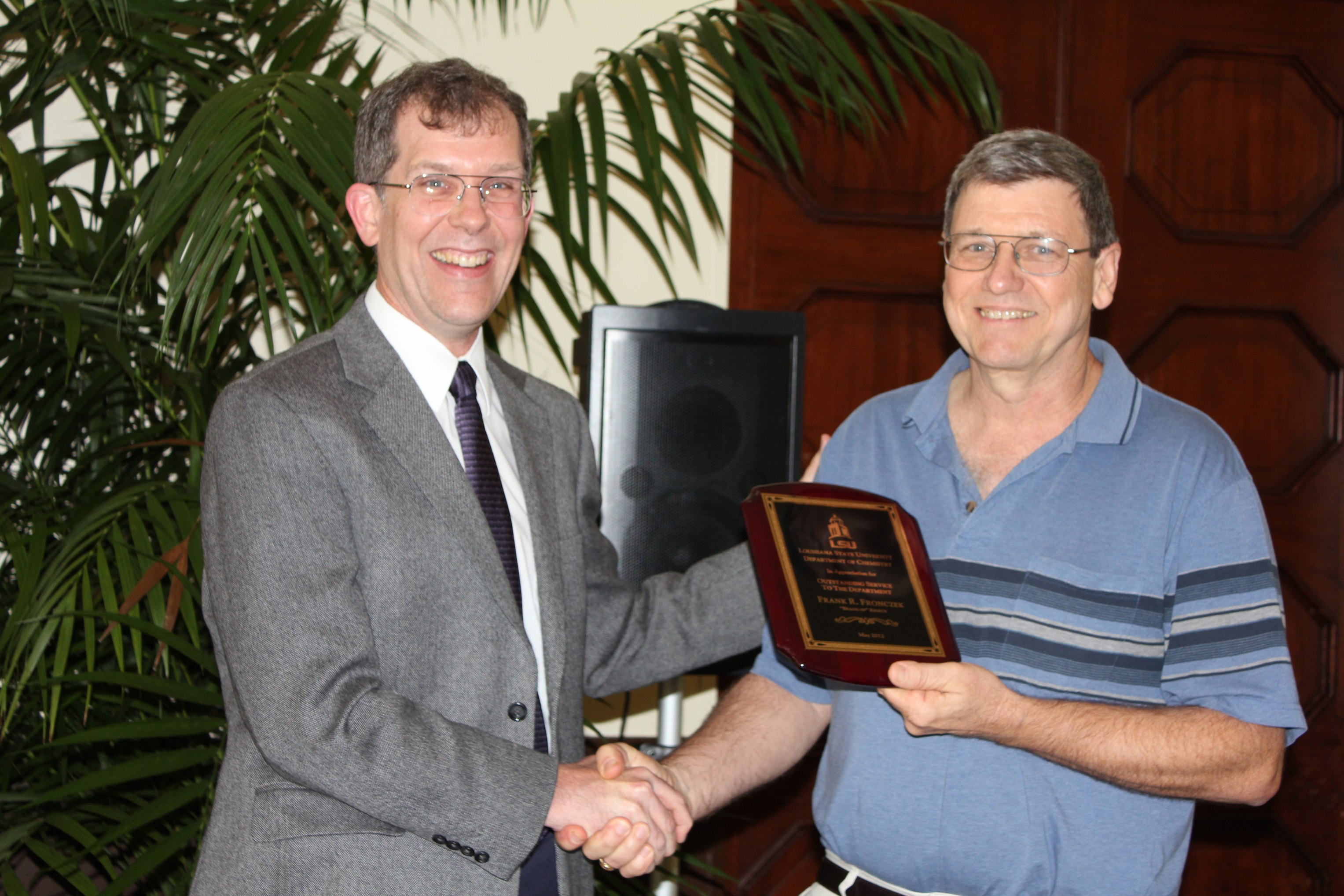 Andrew Maverick (left) presenting Frank Fronczek with Outstanding Service Award in Chemistry (2012).