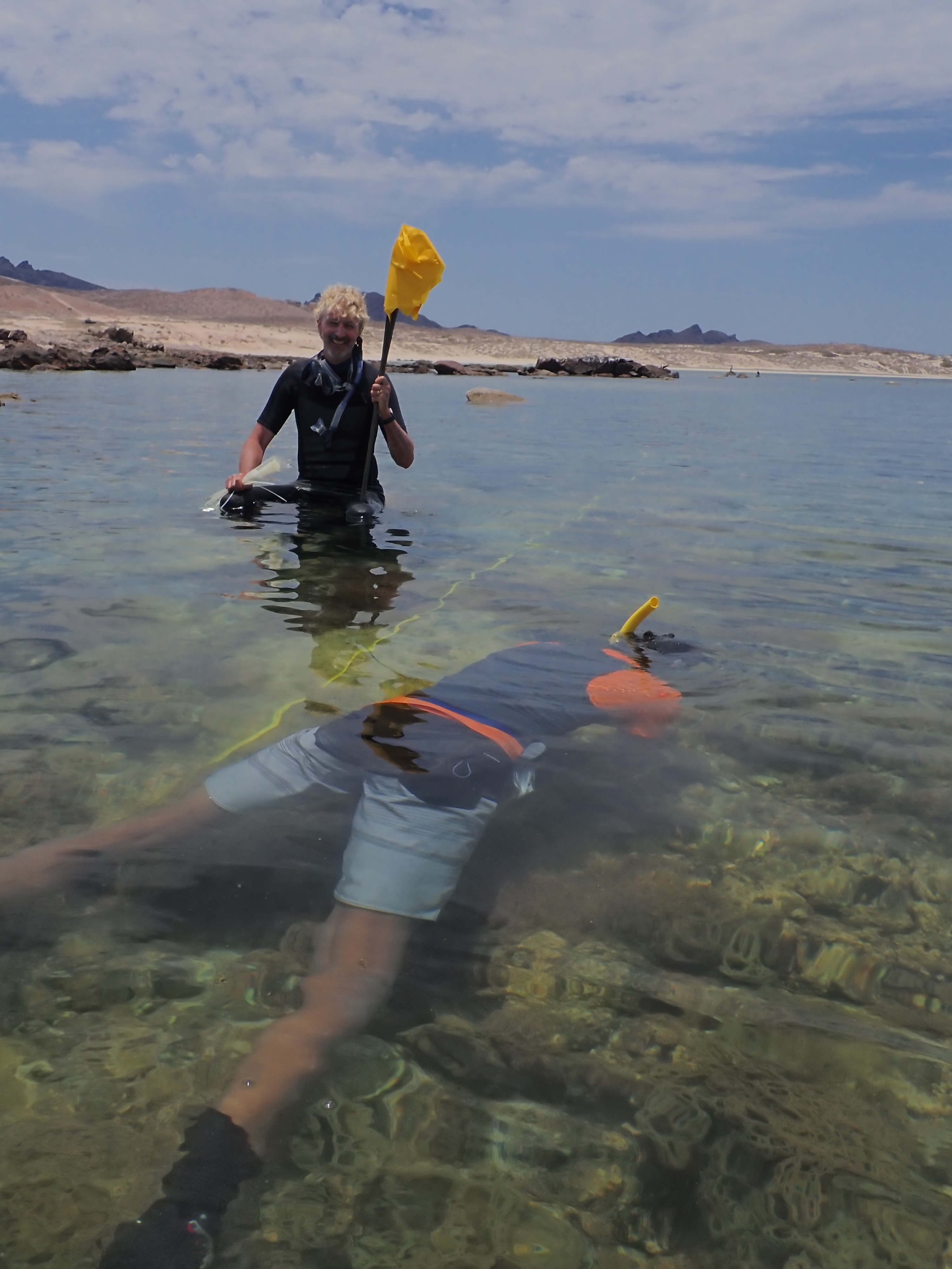Dr. Hellberg and a PhD student at the snorkeling