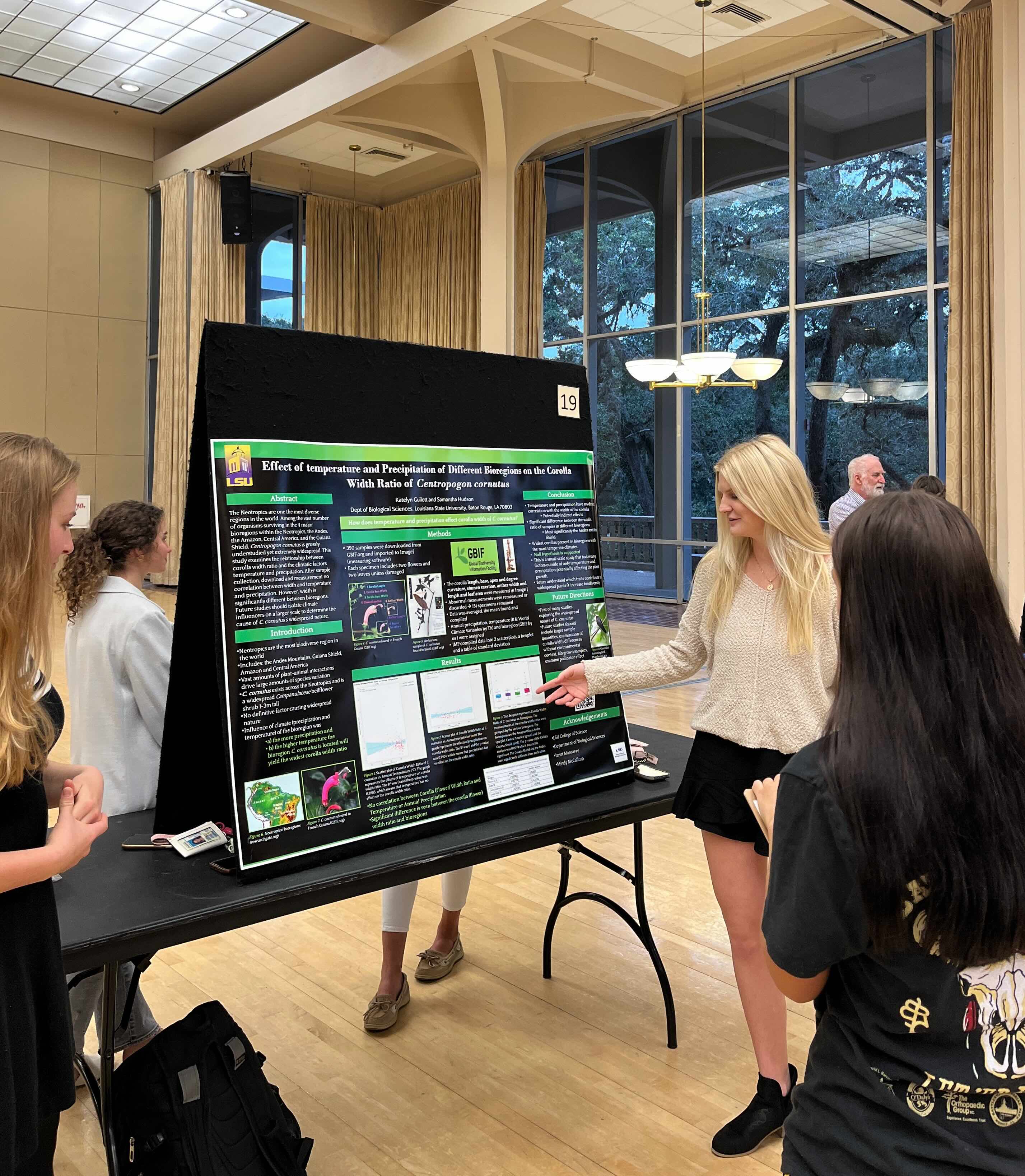 Students presenting a research poster