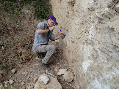 Dr. Forte collecting samples of fragmented limestone from a block within the Kura Fold-Thrust Belt in the eastern part of the Republic of Georgia in 2018.