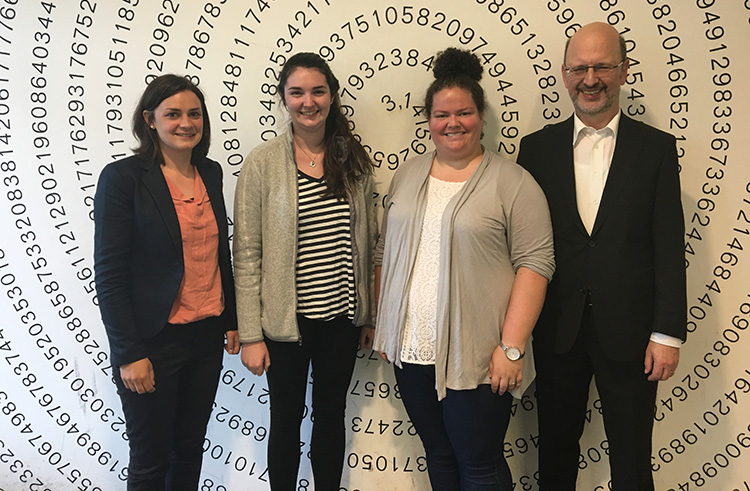 Mathematikum staff with GeauxTeach students Kathryn Cahalan and Allyson Morthland.