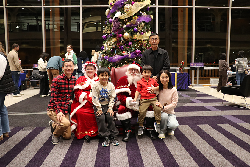 family with Santa and Mrs. Claus