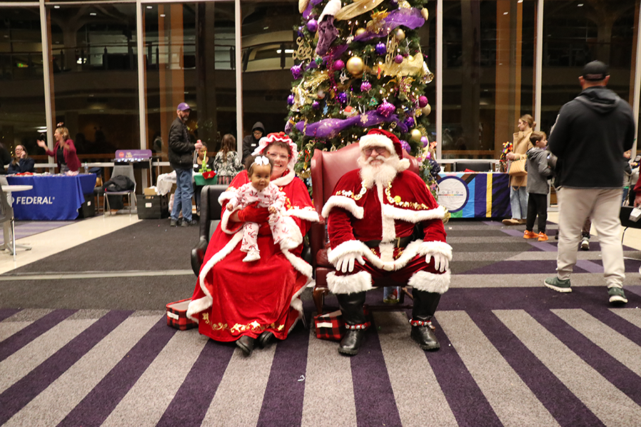 baby with Santa and Mrs. Claus
