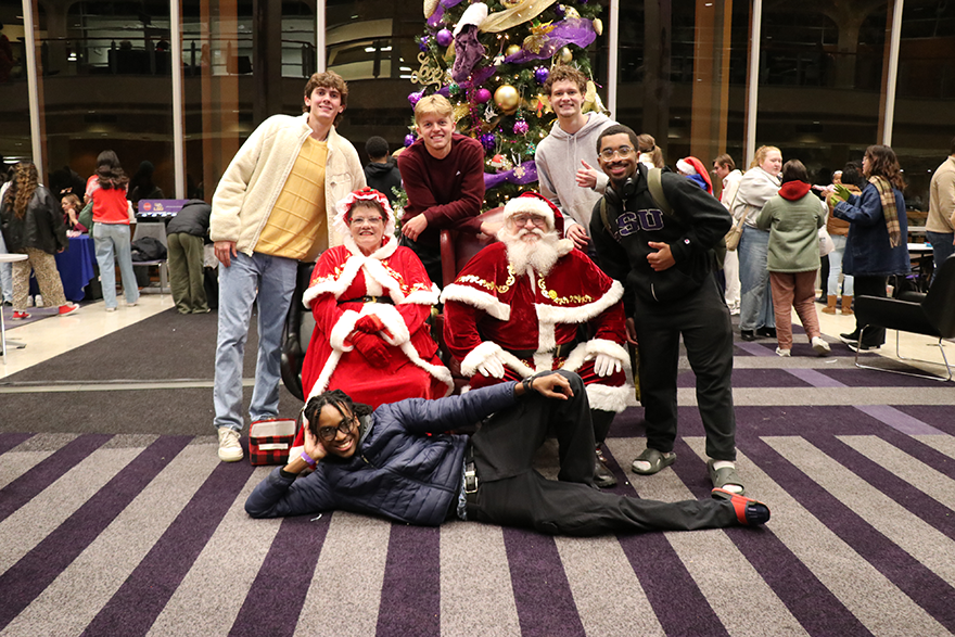students with Santa and Mrs. Claus