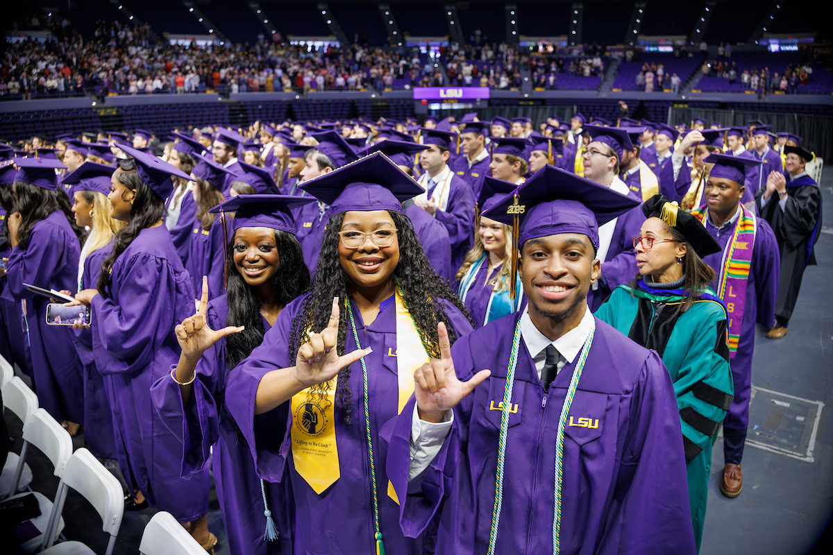 students at commencement in first gen blue cord