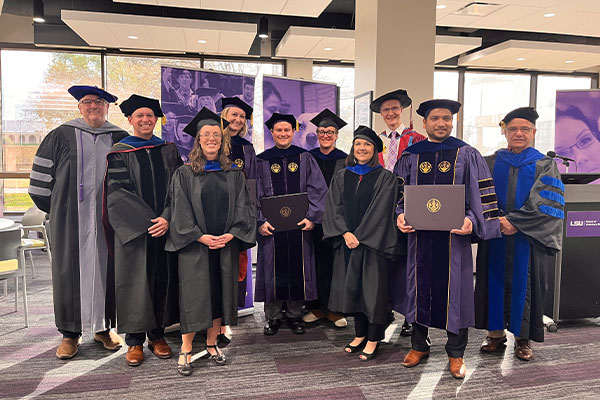 graduates and mentors at Fall 2023 commencement
