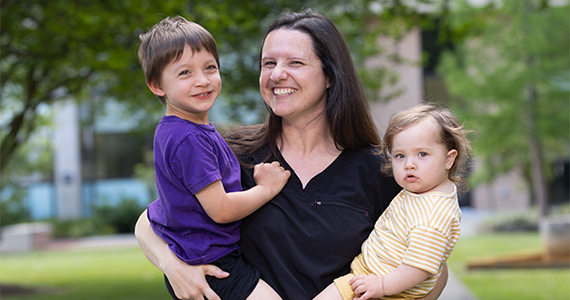 Kristi Haakma holding her two children