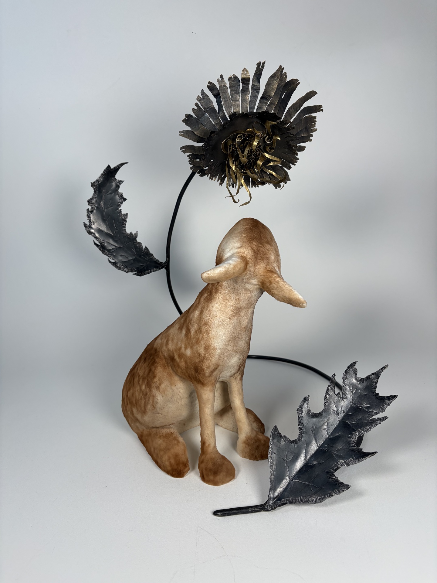 Swamp Rabbit, a sculpture consisting of steel, foam, clay, flocking, sheet metal bullet casings, and wire
