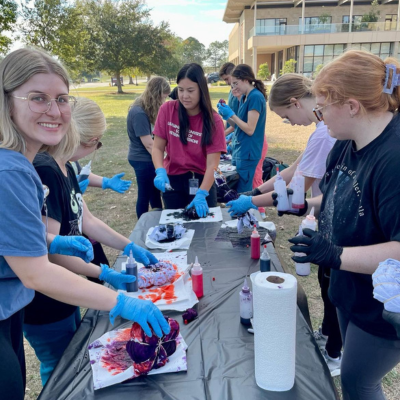 Students tie dying t-shirts